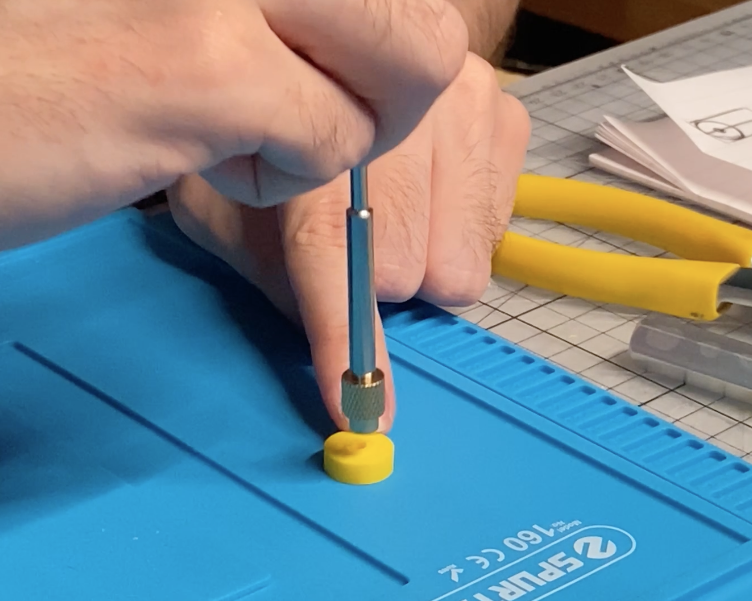 Using soldering iron to smooth the plastic. Didn't go too well.