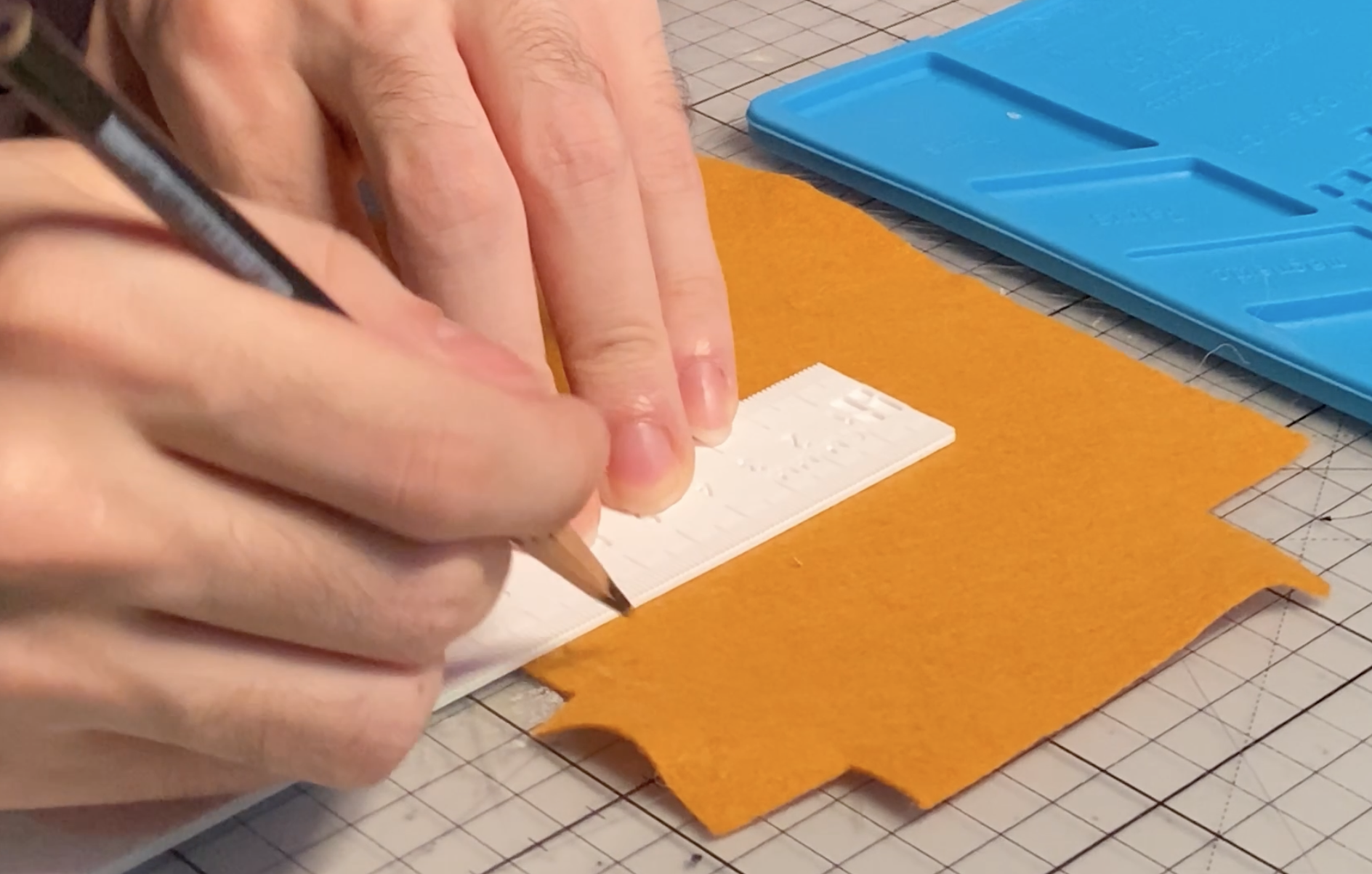 Marking the fabric for later cuts.